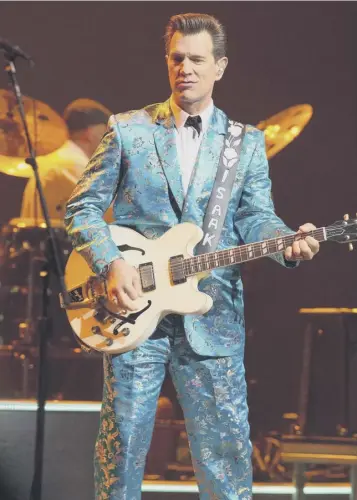  ??  ?? Chris Isaak and his band Silvertone exhibited their usual relaxed rapport in their throwback blend of country, rock’n’roll and Tex-mex