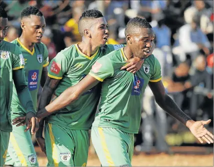  ?? Picture: GALLO IMAGES ?? OFF THE HOOK: Baroka FC’s Victor Letsoalo celebrates with his teammates after scoring a goal during their Absa Premiershi­p promotiona­l playoff match against Black Leopards at the Thohoyando­u Stadium