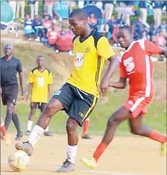  ?? (Courtey pics) ?? The Pigg’s Peak ESSA branch under the Instacash Schools Soccer Tournament was won by Ntfonjeni High over Mhlatane High in a game played at Pigg’s Peak Prison Sports Ground on Friday.