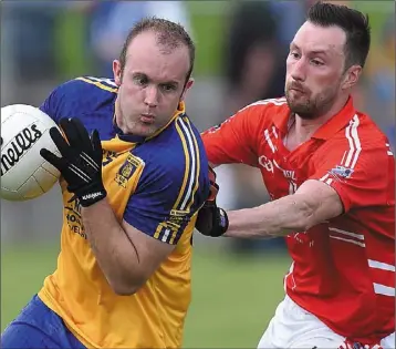  ??  ?? St Mochta’s Liam McGranagha­n is tracked by Hunterstow­n’s Alan Landy. Picture: Paul Connor