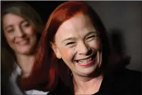  ?? CP PHOTO SEAN KILPATRICK ?? Catherine Tait smiles as Heritage Minister Melanie Joly announces that Tait is the new president and CEO of CBC/Radio-Canada during a press conference in the foyer of the House of Commons on Tuesday.