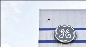  ?? LOIC VENANCE/AFP ?? The logo of US company General Electric is seen at a factory of the group, in Montoirde-Bretagne, western France.