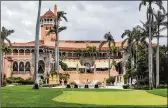  ?? GREG LOVETT / THE PALM BEACH POST ?? A flag with a Mar-a-Lago logo flies on a putting green at the opulent private club created in 1995 in Palm Beach.