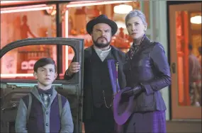  ?? Quantrell Colbert / Associated Press ?? From left, Owen Vaccaro, Jack Black and Cate Blanchett in a scene from “The House with a Clock in Its Walls.” Below, Vanessa Anne Williams with Vacarro.