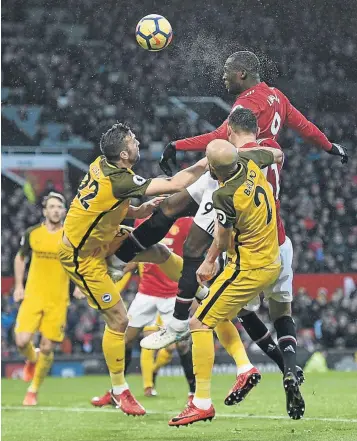  ?? / AFP PHOTO ?? Manchester United’s Belgian striker Romelu Lukaku heads the ball during the Premier League clash against Brighton. Lukaku is struggling to regain form, but his coach Jose Mourinho is not having sleepless nights.