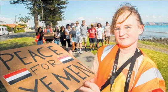  ?? Photo / Paul Taylor ?? Meg Higgs from Rise for Lives led Saturday’s peace walk in Napier.