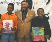  ?? ?? Hilton Witbooi and Mahlulwa Vengile with Deputy Mayor Raybin Figland. They both received A+++ in the Visual Art division.