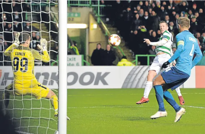  ?? Picture: Getty Images. ?? Callum McGregor’s shot flies past Zenit keeper Andrei Lunev to break the deadlock.