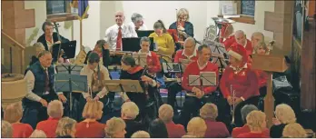  ??  ?? Arran Brass and string group Arco provided the music for the carol service.