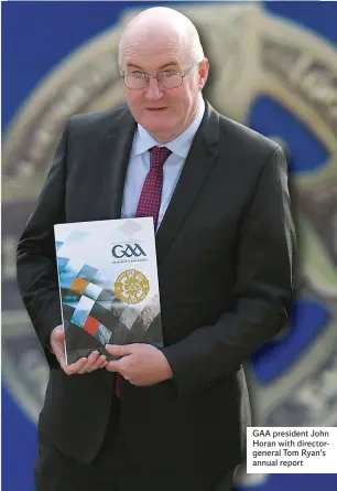  ??  ?? GAA president John Horan with directorge­neral Tom Ryan’s annual report