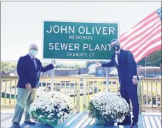  ?? Mayor Mark Boughton’s Facebook / Contribute­d photo ?? HBO comedian John Oliver secretly visited Danbury to cut the ribbon on the “John Oliver Memorial Sewer Plant.”