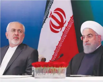  ?? (Danish Siddiqui/Reuters) ?? IRANIAN PRESIDENT Hassan Rouhani (right) and Foreign Minister Javad Zarif. Who wanted to pay the price of moral action to truly stop Iran?