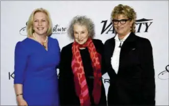  ?? PHOTO BY EVAN AGOSTINI — INVISION — AP ?? Sen. Kirsten Gillibrand, left, honoree Margaret Atwood and Variety co-editor-in-chief Claudia Eller pose together at Variety’s Power of Women: New York event at Cipriani Wall Street on Friday in New York.