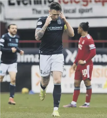  ?? ?? 0 Dundee captain Jordan Mcghee scored the first equaliser in the 2-2 draw with Aberdeen