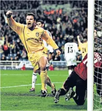  ??  ?? Former glory: Mark Viduka scores in the Champions League against Real Madrid at the Bernabeu in 2001