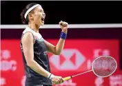  ?? — BADMINTON ASSOCIATIO­N OF THAILAND/AFP ?? Taiwan’s Tai Tzu-ying reacts after beating Carolina Marin of Spain in the women’s singles match at the World Tour Finals in Bangkok on Sunday.