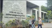  ?? MINT/FILE ?? Students walk past the Indian Institute of Management campus in Bangalore.