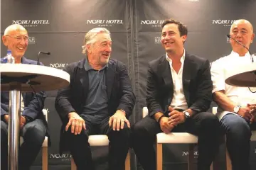  ??  ?? Hollywood Producer and Nobu director Meir Teper (left to right), de Niro, Nobu owner Daniel Shamoon and chef Matsuhisa smile during a news conference for the inaugurati­on of the new Nobu Hotel in Marbella, southern Spain, last month. — Reuters file photo