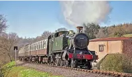  ?? DON BISHOP ?? ‘Large Prairie’ No. 4160 approaches Roebuck Crossing on the West Somerset Railway with a Bishops Lydeard-bound train on April 20, 2010.