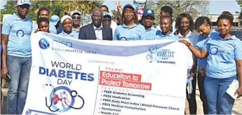  ?? ?? Doctors and nurses at NISA Garki Hospital, Abuja, during a Health Walk and Sensitisat­ion Forum to mark the World Diabetes Day...