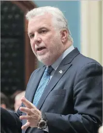  ?? CLEMENT ALLARD/THE CANADIAN PRESS ?? Premier Philippe Couillard on Thursday expressed “deep disappoint­ment” in the federal budget, adding that he “expects” Ottawa will help fund the province’s key transit projects.