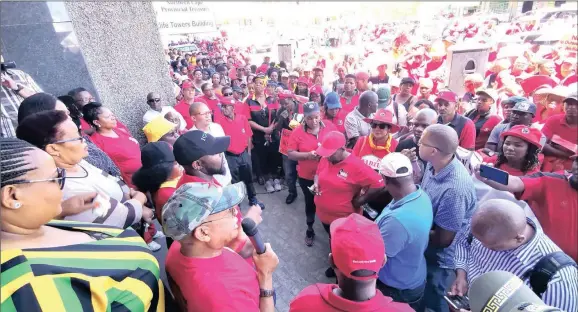  ?? MEMORANDUM: Soraya Crowie ?? The premier of the Northern Cape, Sylvia Lucas (left), yesterday received a memorandum of grievances from Cosatu following a march held in Kimberley.Picture: