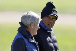  ?? RYAN KANG — THE ASSOCIATED PRESS ?? Tiger Woods, right, talks to PGA Commission­er Jay Monahan on the 15th hole during the pro-am of the Genesis Invitation­al golf tournament at Riviera Country Club, Wednesday, Feb. 15, 2023, in the Pacific Palisades area of Los Angeles.