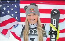  ?? MARCO TROVATI/AP PHOTO ?? Lindsey Vonn celebrates after taking third place during the women’s downhill race on Sunday at the World Championsh­ips in Are, Sweden.