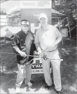  ?? LARRY REA / SPECIAL TO THE COMMERCIAL APPEAL ?? Fishing guru Ron Wong of Memphis (left), a two-time winner of the St. Jude Bass Classic, says PGA Tour pro Boo Weekley “is a great ambassador for the outdoors.”