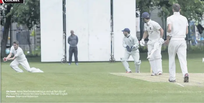  ??  ?? On form Jamie MacDonald taking a catch at first slip off the bowling of Steven McLister to dismiss Michael English Picture: Raymond Robertson