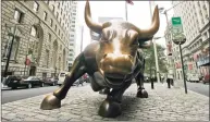  ?? Mary Altaffer / Associated Press file photo ?? The charging bull in lower Manhattan in New York in 2006.