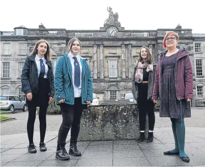  ?? Picture: Kim Cessford. ?? From left: History pupils Heather Beer, Rachel Fallon and Corey Coutts with subject teacher Laura Hobson outside the building.