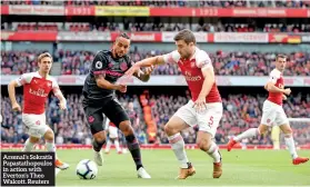  ?? Reuters ?? Arsenal’s Sokratis Papastatho­poulos in action with Everton’s Theo Walcott.