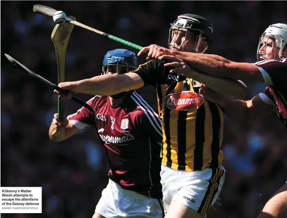  ?? RAMSEY CARDY/SPORTSFILE ?? Kilkenny’s Walter Walsh attempts to escape the attentions of the Galway defence