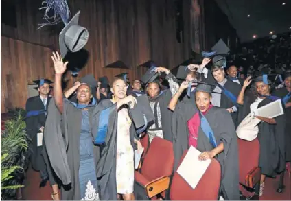  ??  ?? Hats off: Exuberant Gibs MBA graduates prepare to take the world of business by storm