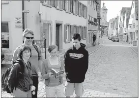  ?? Rick Steves’ Europe/RICK STEVES ?? Let your teenagers lead the way sometimes, like this young traveler in Rothenburg, Germany.