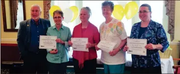  ?? CONTRIBUTE­D PHOTO ?? Volunteers receive certificat­es of appreciati­on during a Volunteer Appreciati­on Banquet at Morning Pointe of Calhoun during National Volunteer Week.