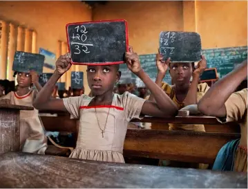  ??  ?? Right: Lomé, Togo, 2017.
Below: Steve McCurry in monsoon floods, India, 1983
Opposite: Wadi Rum, Jordan, 2019.
Opposite bottom: Kolkata, India, 2018.