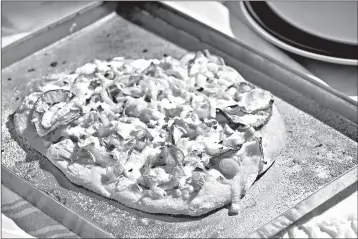  ?? Photo by Tom McCorkle for The Washington Post ?? Potato Leek Pizza.