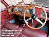  ??  ?? Aftermarke­t woodrim wheel colour-matches dash trim well