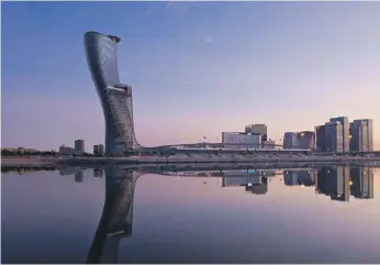  ?? Hyatt Capital Gate ?? The Hyatt Capital Gate hotel in Abu Dhabi – soon to become Andaz Capital Gate – is one of Abu Dhabi’s eye-catching hotels which are the focus of efforts to grow the economy