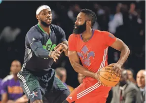  ?? DERICK HINGLE/USA TODAY SPORT ?? LeBron James and James Harden face off at the 2014 NBA All-Star Game. Could they team up in Houston next season?
