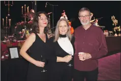  ?? (NWA Democrat-Gazette/Carin Schoppmeye­r) ?? Brandy Molloy (from left) and Melissa and Steve Hotchkiss visit at Ooh! La, la!