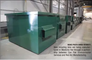  ?? NEWS PHOTO EMMA BENNETT ?? New recycling bins are being manufactur­ed in Medicine Hat through a partnershi­p between Can Pak Environmen­tal Services and Red Arc Manufactur­ing.