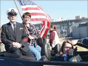  ?? TIMES photograph by Annette Beard ?? U.S. Navy CPO veteran John Ruddick who served during the Vietnam War was joined by wife, Sue Walker Ruddick, as grand Marshall of the Pea Ridge Veterans Parade Saturday, Nov. 9, 2019. Driving him were Josh and Kathryn Cottrell.