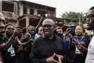  ?? Meinhardt/AFP/Getty Images ?? Labour party presidenti­al candidate Peter Obi talks to the media at outside a polling station in Amatutu. Photograph: Patrick