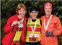  ?? ?? Janet Fellowes, Linda Wright and Julia McAfee from Helensburg­h AAC won bronze in the women’s 50+ race at the Scottish National Road Relay Championsh­ips. Image: Bobby Gavin