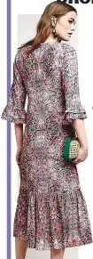  ??  ?? Printed dress, £180, anthropolo­gie.com