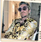  ??  ?? Rock it, man: David Beckham in another opulent Versace shirt