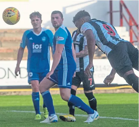  ?? Craig Brown. ?? Myles Hippolyte gets on the end of Ryan Williamson’s cross to head home Dunfermlin­e’s opening goal.